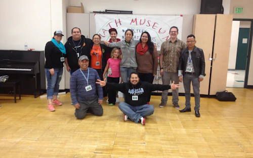 Tutors and Instructors stand in a group