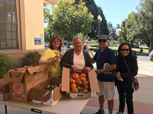 four people and fresh food