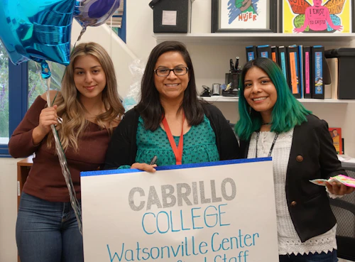 three students in office