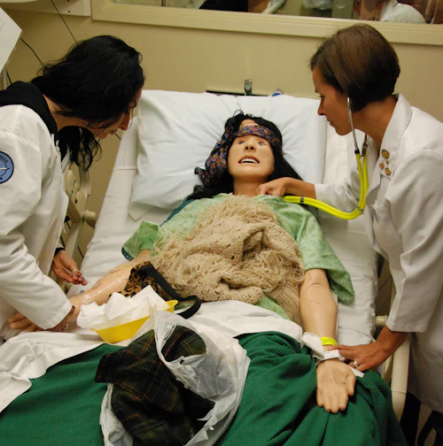 female nursing students practicing