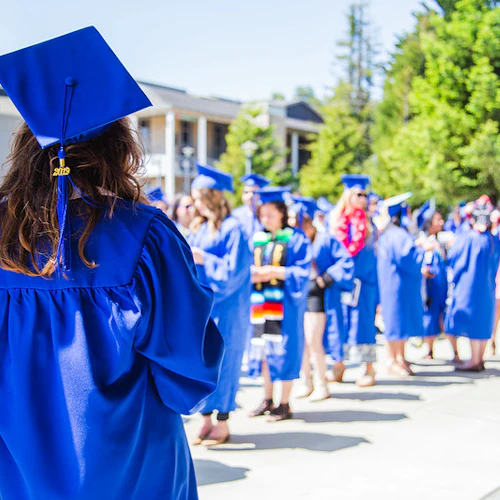 graduating student facing away