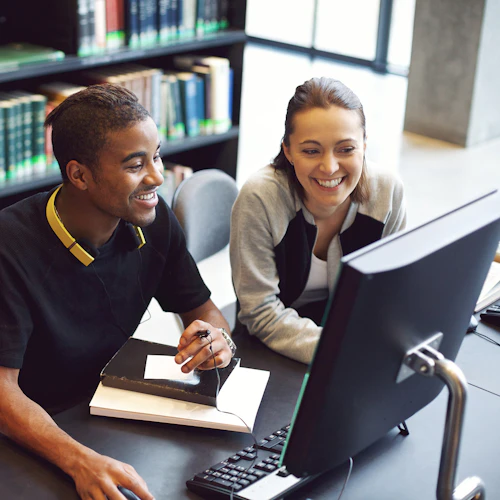 Student group on a computer