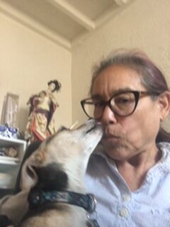 Robin with dog in home office