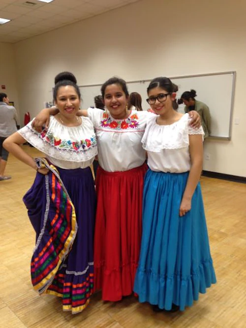 three females standing
