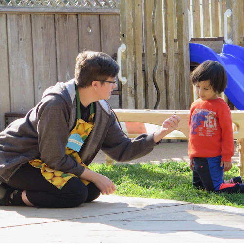 Intern teachers refine their skills of how to connect and build strong relationships as they guide children’s behavior in positive ways.