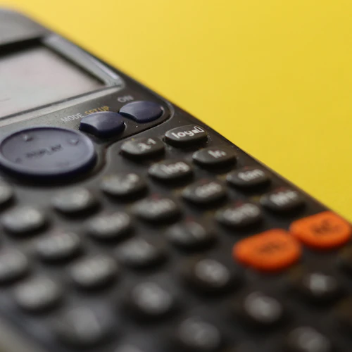 Image of calculator on a yellow background