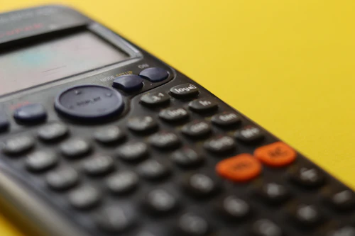 Image of calculator on a yellow background