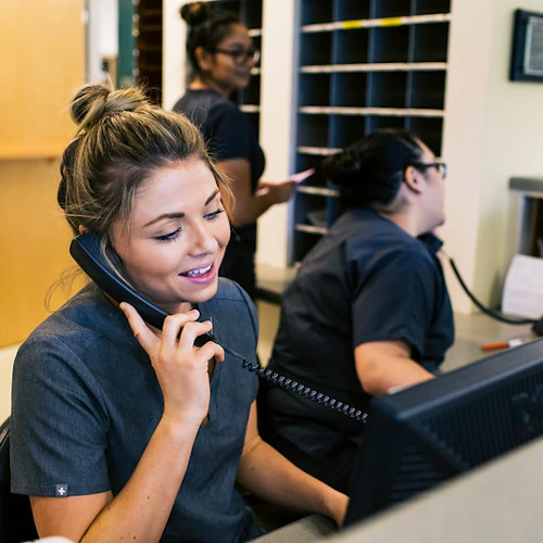 student answering phone