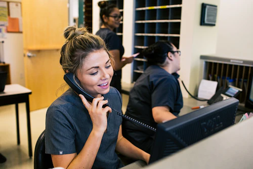 student answering phone