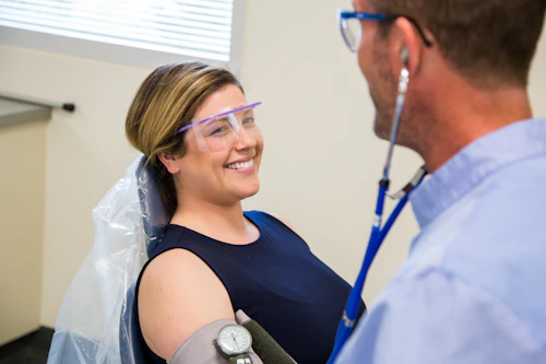 student taking blood pressure