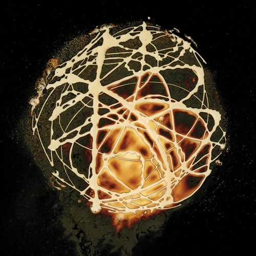 chemigram image of circle with network of drips