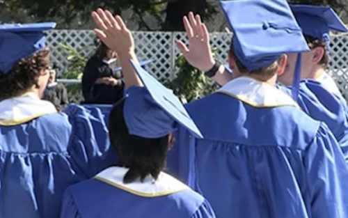 grad ceremony high five