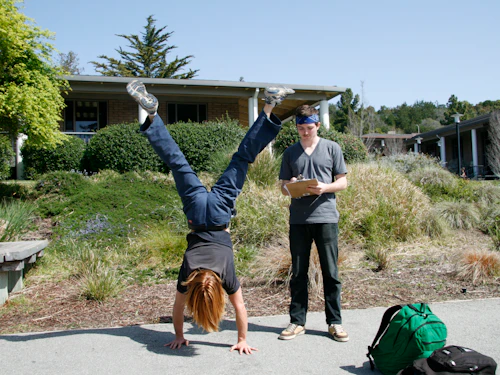 student doing a handstand