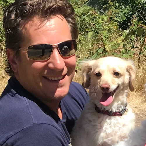 Picture of Professor Greenstein and his dog Buddy Love