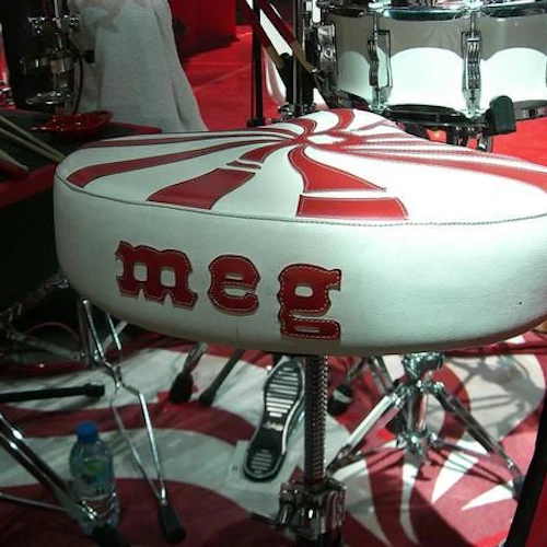 drum seat with the name Meg on it.