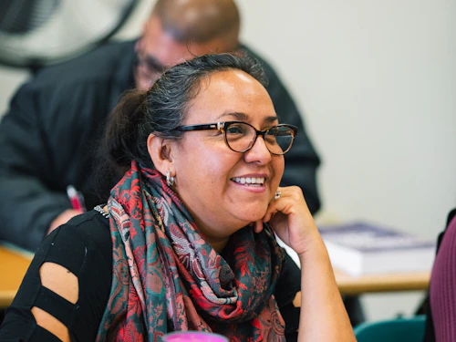 smiling student in classroom