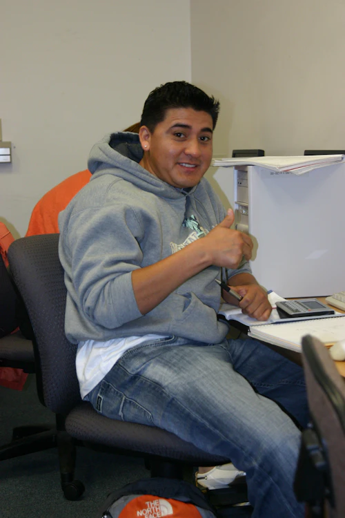 student giving thumbs up