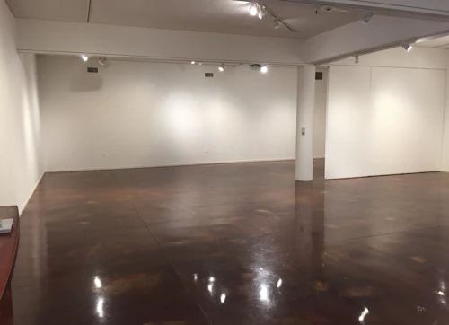 Interior of gallery facing back end