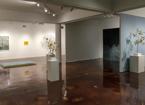 Installation view of metal sculptures and painted plexiglas