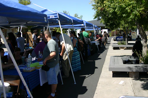 students being helped at tents outside