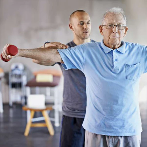 Physical Therapist working with a patient