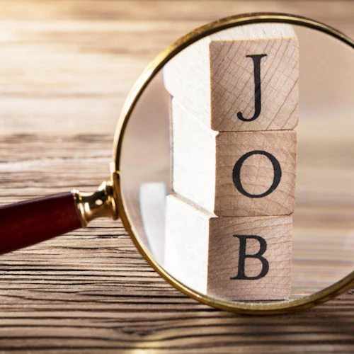 Lupa mostrando la palabra TRABAJO