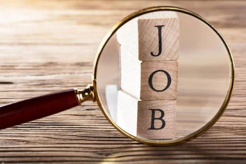 Lupa mostrando la palabra TRABAJO