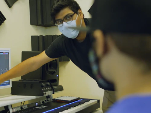 Casey working with student