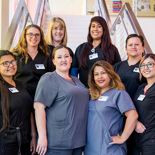female medical assistants standing on the stairs