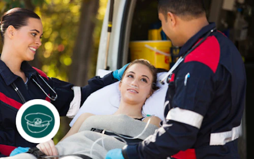 patient being looked after by EMT's