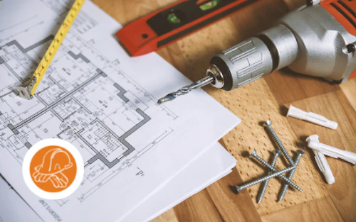 building draring with nails and drill nearby