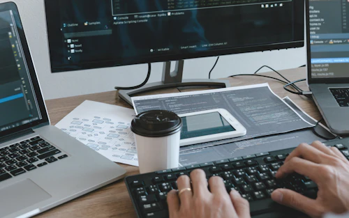 computer keyboard and monitors