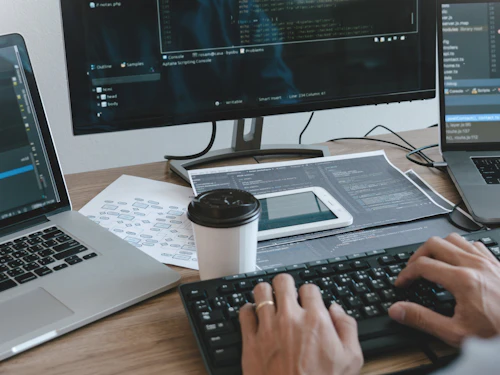 computer keyboard and monitors