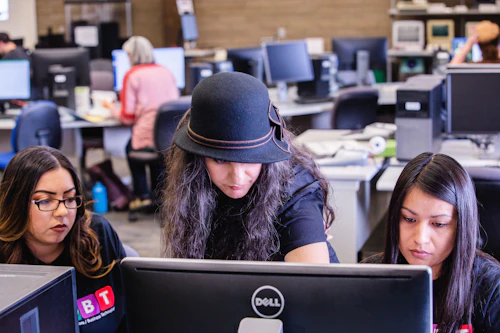 an instructor helping out students