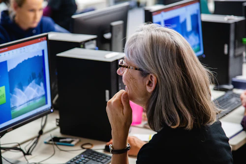 female student looking at the computer