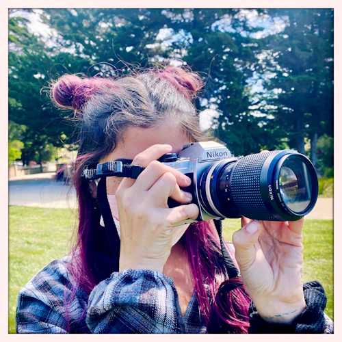 art photography student using a camera