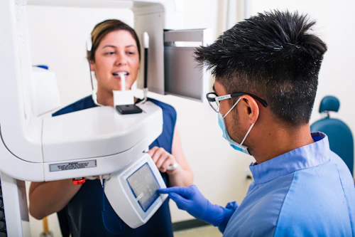 dental student using the xray machine