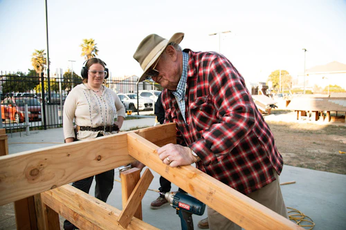 instructor working with students
