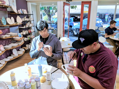 Student Assistants Having Fun Painting at Petroglyph