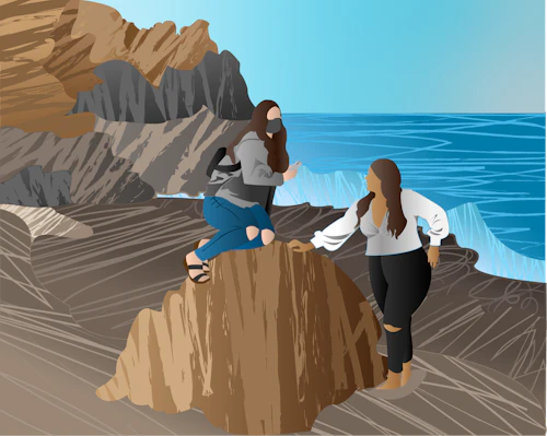 personas en una playa dibujando