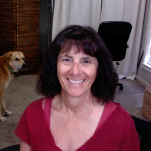 Photo of Denise and Buddy the dog