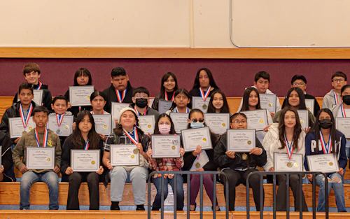 Photo of Students with Certificates and Medals