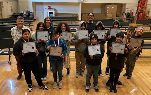 Mission Hill Middle School Students with Certificates and Medals