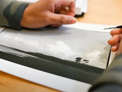 student looking at work