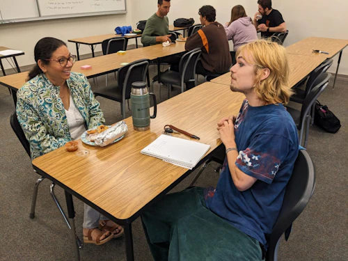 Math instructor and tutor getting to know eachother