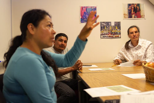 Students talk in a conversation group