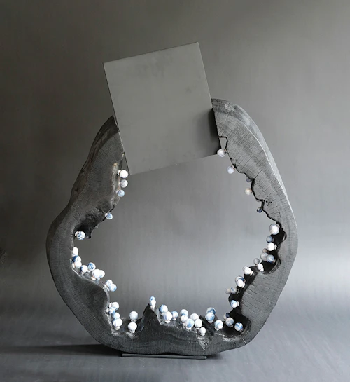 Priyanka Rana Moonlight sculpture, wood outer section of trunk, aluminum square and white nods