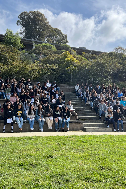 student seated in the amphitheater