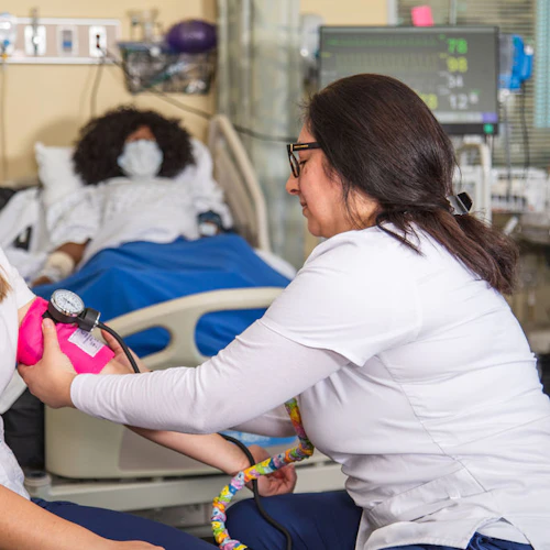 students practicing nursing skills