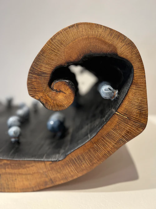 "Dancers in Denim,"detail, oak, charred wood, fabric, polyurethane